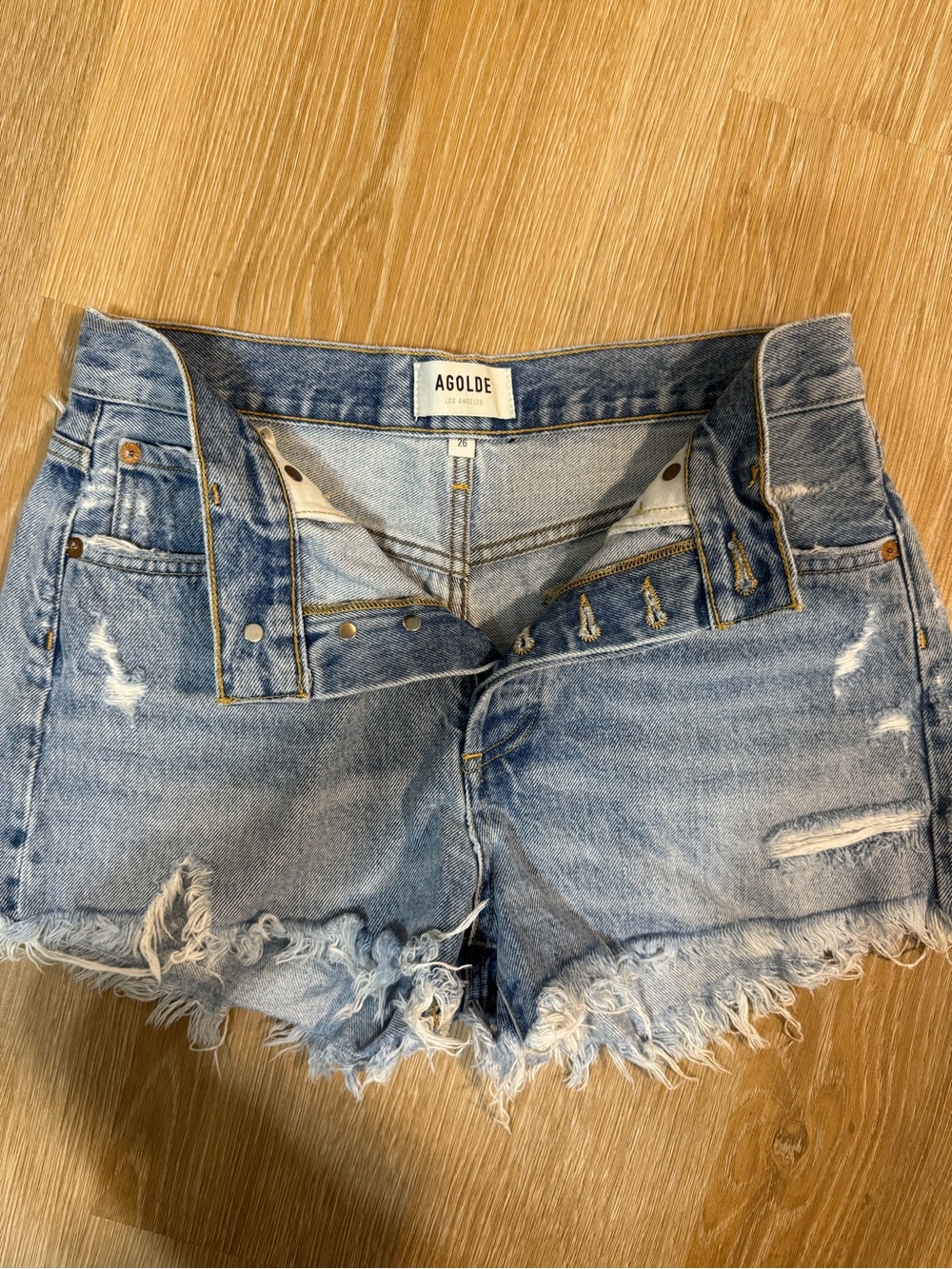 Agolde Light Blue Distressed Cutoff Denim Shorts